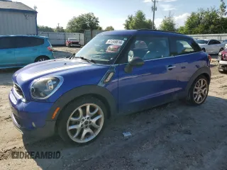 2013 MINI Paceman S with VIN WMWSS5C50DWN49267, listed as a Copart auction lot 61349614 with 106,685 mi miles and Salvage Title. Bid and sale history available at DreamBid. Image 1.