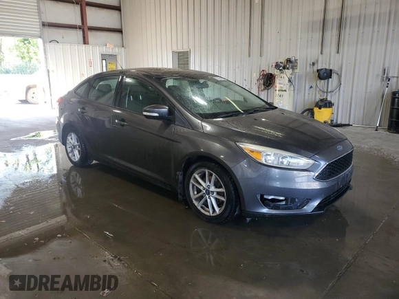 2015 Ford Focus SE with VIN 1FADP3F29FL310622, listed as a Copart auction lot 63591065 with 119,957 mi miles and Salvage title. Bid and sale history available at DreamBid. Image 4.