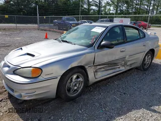 2004 Pontiac Grand Am GT z VIN 1G2NW52E74C179558, wystawiony jako IAAI lot #42191752 z przebiegiem 256 688 mil mil oraz . Historia ofert i sprzedaży dostępna na DreamBid. Obrazek 6.