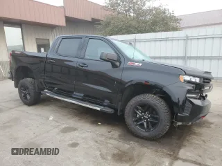 2019 Chevrolet Silverado 1500 LT Trail Boss with VIN 3GCPYFED2KG298975, listed as a Copart auction lot 71375354 with 77,195 mi miles and Salvage Title. Bid and sale history available at DreamBid. Image 4.