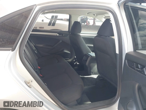 2015 Volkswagen Passat 1.8T Wolfsburg Ed with VIN 1VWAT7A31FC028990, listed as a IAAI auction lot 41778229 with 73,553 mi miles. Bid and sale history available at carsss.com. Image 8.