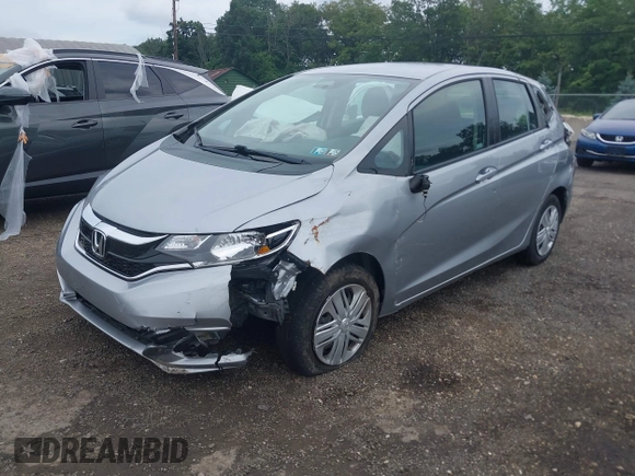 2019 Honda Fit LX z VIN 3HGGK5H45KM725916, wystawiony jako IAAI lot #42654907 z przebiegiem 92 580 mil mil oraz . Historia ofert i sprzedaży dostępna na DreamBid. Obrazek 21.
