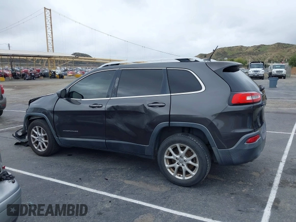 2014 Jeep Cherokee Latitude z VIN 1C4PJLCS2EW217130, wystawiony jako IAAI lot #41782039 z przebiegiem 129 080 mil mil oraz . Historia ofert i sprzedaży dostępna na DreamBid. Obrazek 14.