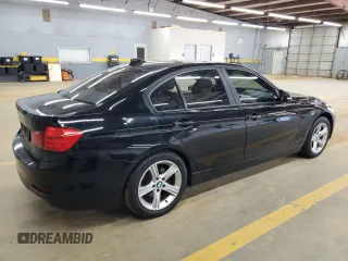 2012 BMW 3 Series 328i with VIN WBA3A5C56CF347250, listed as a Copart auction lot 50598665 with 134,361 mi miles and Salvage title. Bid and sale history available at DreamBid. Image 3.