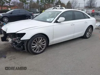 2013 Audi A6 Premium Plus with VIN WAUGFAFC6DN051237, listed as a IAAI auction lot 41553452 with 114,446 mi miles and . Bid and sale history available at DreamBid. Image 18.