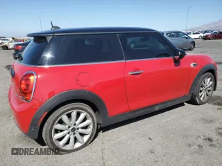 2021 MINI Hardtop Oxford Edition with VIN WMWXR3C09M2N13515, listed as a Copart auction lot 58490325 with 77,064 mi miles and Salvage title. Bid and sale history available at DreamBid. Image 3.