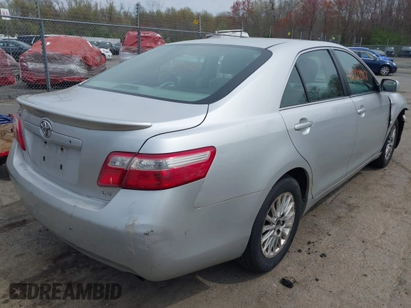2007 Toyota Camry CE with VIN 4T1BE46K47U528827, listed as a IAAI auction lot 42123907 with 257,248 mi miles. Bid and sale history available at carsss.com. Image 4.