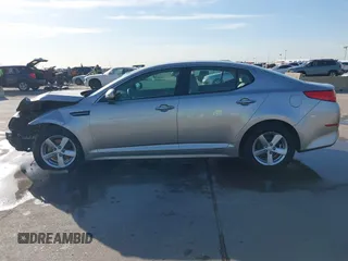 2015 Kia Optima LX with VIN 5XXGM4A71FG484306, listed as a IAAI auction lot 41797482 with 116,181 mi miles and . Bid and sale history available at carsss.com. Image 15.
