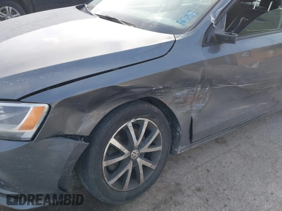 2016 Volkswagen Jetta Sedan 1.4T SE with VIN 3VWD67AJ7GM281671, listed as a IAAI auction lot 41385896 with 153,168 mi miles. Bid and sale history available at carsss.com. Image 6.