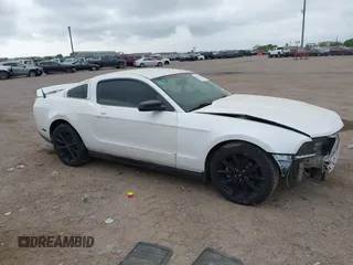 2012 Ford Mustang Premium with VIN 1ZVBP8AM6C5211096, listed as a IAAI auction lot 41871346 with 236,649 mi miles and . Bid and sale history available at DreamBid. Image 1.