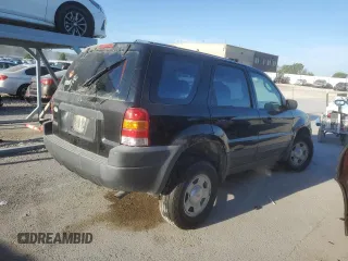 2004 Ford Escape XLS with VIN 1FMYU921X4KA14947, listed as a Copart auction lot 71589544 with 173,890 mi miles and Salvage Title. Bid and sale history available at DreamBid. Image 3.