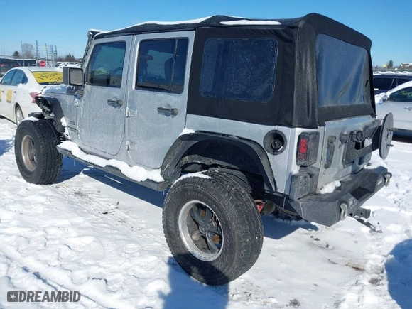 2010 Jeep Wrangler Unlimited Sport with VIN 1J4BA3H11AL102891, listed as a IAAI auction lot 41576869 with 213,204 mi miles. Bid and sale history available at carsss.com. Image 3.