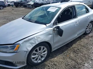 2015 Volkswagen Jetta Sedan 1.8T SE with VIN 3VWD17AJ3FM297573, listed as a IAAI auction lot 41884541 with 98,225 mi miles. Bid and sale history available at carsss.com. Image 6.