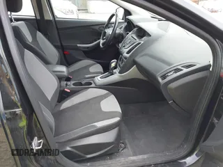 2012 Ford Focus SE with VIN 1FAHP3F24CL173182, listed as a IAAI auction lot 41905495 with 119,663 mi miles. Bid and sale history available at carsss.com. Image 5.