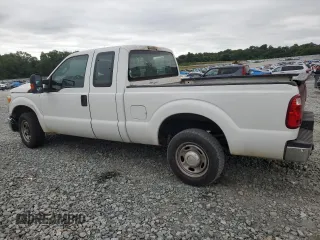 2014 Ford F-250 XLT with VIN 1FT7X2A65EEA98638, listed as a Copart auction lot 60948084 with 319,812 mi miles and Salvage title. Bid and sale history available at DreamBid. Image 2.