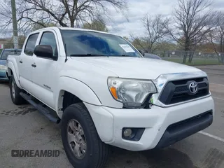2015 Toyota Tacoma with VIN 5TFLU4EN6FX120947, listed as a IAAI auction lot 42043239 with 125,480 mi miles and . Bid and sale history available at DreamBid. Image 1.