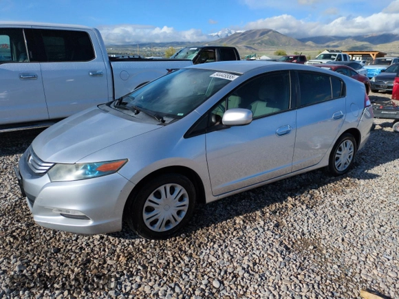 2010 Honda Insight LX with VIN JHMZE2H51AS011243, listed as a Copart auction lot 54445555 with 224,722 mi miles and Salvage Title. Bid and sale history available at DreamBid. Image 1.