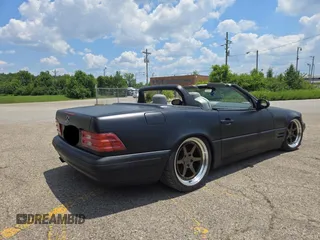 1999 Mercedes-Benz SL 500 with VIN WDBFA68FXXF184548, listed as a Copart auction lot 63814775 with 133,681 mi miles and Clean title. Bid and sale history available at DreamBid. Image 4.