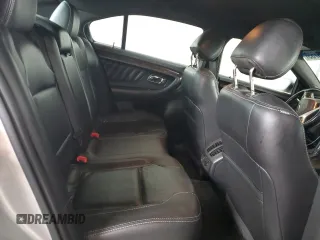 2014 Ford Taurus Limited z VIN 1FAHP2F82EG115503, wystawiony jako Copart lot #64836755 z przebiegiem 111 691 mil mil oraz Szkoda całkowita • Salvage title. Historia ofert i sprzedaży dostępna na DreamBid. Obrazek 10.