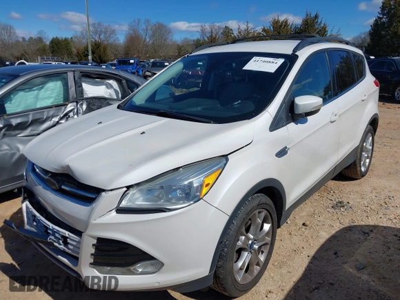 2013 Ford Escape SEL with VIN 1FMCU0HX0DUC07372, listed as a IAAI auction lot 41740884 with 96,436 mi miles and . Bid and sale history available at DreamBid. Image 2.