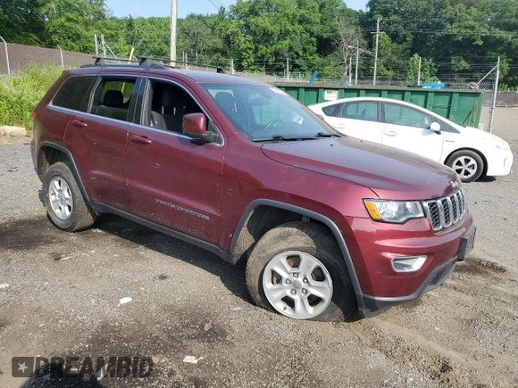 2017 Jeep Grand Cherokee Laredo with VIN 1C4RJFAG8HC940849, listed as a Copart auction lot 59868025 with 111,743 mi miles and Salvage title. Bid and sale history available at DreamBid. Image 4.