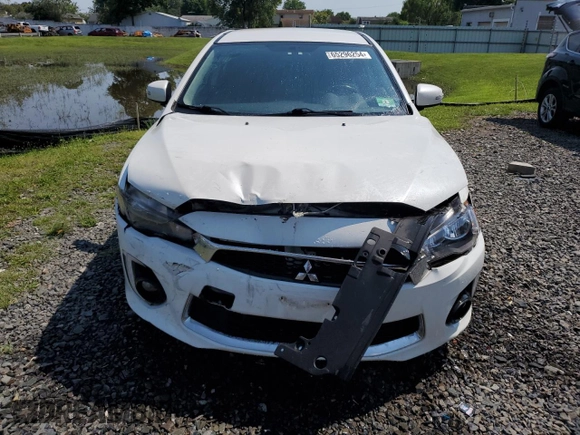 2017 Mitsubishi Lancer ES with VIN JA32V2FW8HU002843, listed as a Copart auction lot 65296254 with 67,310 mi miles and Salvage Title. Bid and sale history available at carsss.com. Image 5.