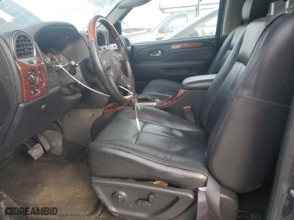 2005 GMC Envoy Denali with VIN 1GKET63M652353972, listed as a Copart auction lot 43690635 with 113,630 mi miles and Clean Title. Bid and sale history available at carsss.com. Image 7.