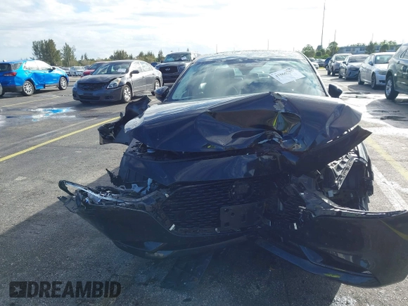 2021 Mazda 3 Premium with VIN JM1BPADL7M1303484, listed as a IAAI auction lot 41666785 with 34,476 mi miles and . Bid and sale history available at DreamBid. Image 6.
