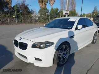 2014 BMW M5 with VIN WBSFV9C55ED593614, listed as a IAAI auction lot 41777369 with NaN miles. Bid and sale history available at carsss.com. Image 17.