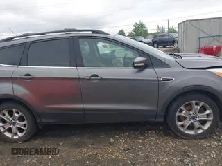 2013 Ford Escape SEL with VIN 1FMCU9HX4DUC75565, listed as a IAAI auction lot 42574351 with 180,876 mi miles and . Bid and sale history available at DreamBid. Image 14.