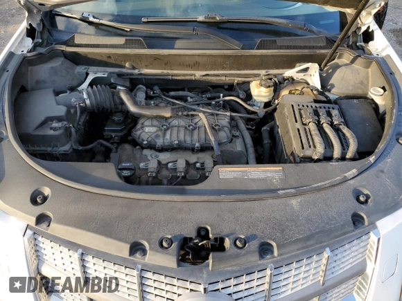 2010 Cadillac SRX Premium Collection z VIN 3GYFNCEY6AS633960, wystawiony jako Copart lot #79262614 z przebiegiem 186 833 mil mil oraz Szkoda całkowita • Salvage title. Historia ofert i sprzedaży dostępna na DreamBid. Obrazek 12.