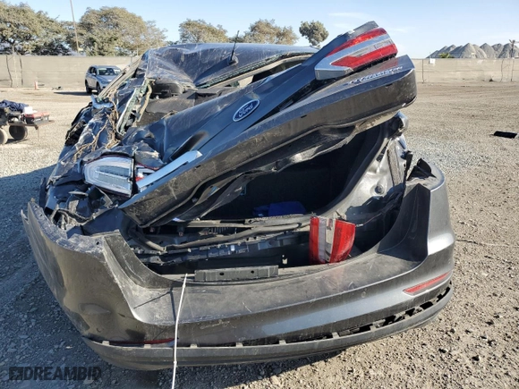 2020 Ford Fusion Plug-In Hybrid Titanium with VIN 3FA6P0SU0LR112720, listed as a Copart auction lot 87236964 with 47,657 mi miles and Salvage Title. Bid and sale history available at carsss.com. Image 6.