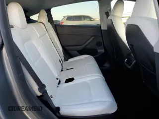 2024 Tesla Model Y Long Range z VIN 7SAYGAEEXRF211507, wystawiony jako Copart lot #56432715 z przebiegiem Nie podano mil oraz Szkoda całkowita • Salvage title. Historia ofert i sprzedaży dostępna na DreamBid. Obrazek 11.
