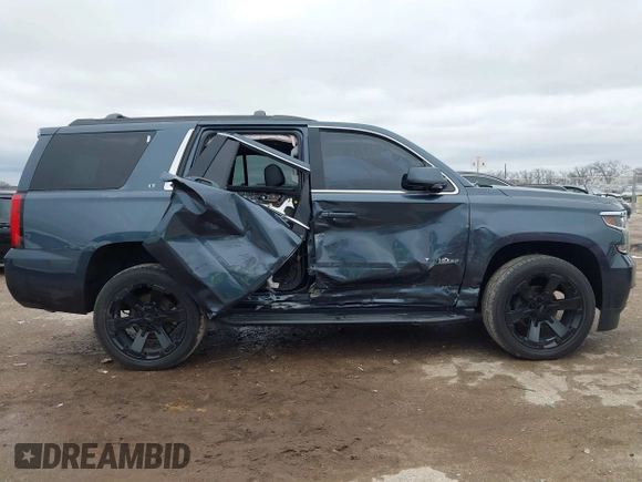 2020 Chevrolet Tahoe LT with VIN 1GNSKBKC3LR306946, listed as a IAAI auction lot 41570785 with 56,603 mi miles and . Bid and sale history available at DreamBid. Image 13.