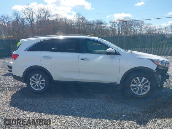 2016 Kia Sorento LX z VIN 5XYPGDA55GG179314, wystawiony jako IAAI lot #42026486 z przebiegiem 116 774 mil mil oraz . Historia ofert i sprzedaży dostępna na DreamBid. Obrazek 14.