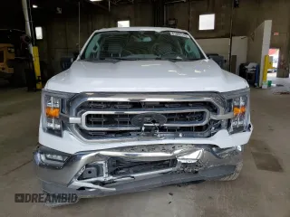 2021 Ford F-150 XL with VIN 1FTFW1E88MKE41611, listed as a Copart auction lot 61092115 with 83,277 mi miles and Salvage title. Bid and sale history available at DreamBid. Image 5.