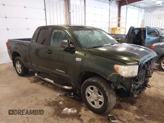 2011 Toyota Tundra with VIN 5TFUY5F12BX173049, listed as a IAAI auction lot 41552652 with 110,592 mi miles and . Bid and sale history available at DreamBid. Image 1.