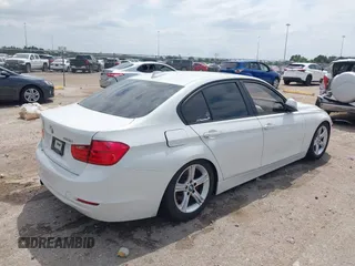 2012 BMW 3 Series 328i with VIN WBA3A5C53CF341664, listed as a IAAI auction lot 41991169 with 168,808 mi miles and . Bid and sale history available at carsss.com. Image 4.