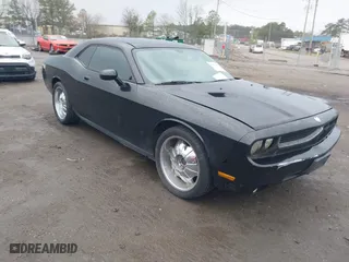 2009 Dodge Challenger SE with VIN 2B3LJ44VX9H522605, listed as a IAAI auction lot 41821296 with 192,059 mi miles. Bid and sale history available at carsss.com. Image 1.