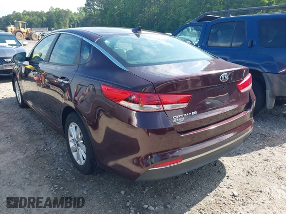 2018 Kia Optima LX z VIN 5XXGT4L39JG180260, wystawiony jako IAAI lot #42081495 z przebiegiem 173 200 mil mil oraz . Historia ofert i sprzedaży dostępna na DreamBid. Obrazek 3.