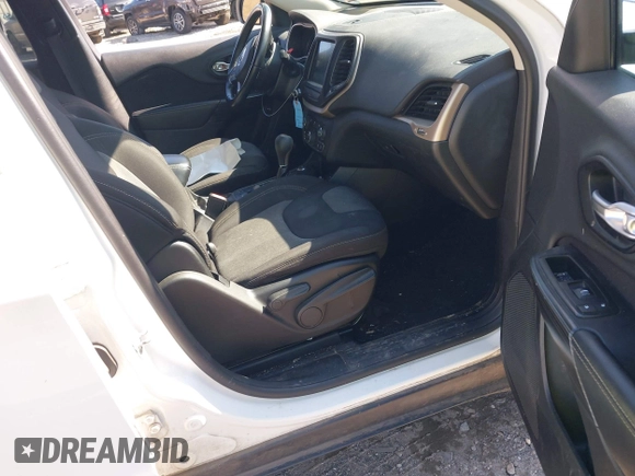 2014 Jeep Cherokee Latitude with VIN 1C4PJMCS9EW309289, listed as a IAAI auction lot 42003252 with 99,360 mi miles and . Bid and sale history available at DreamBid. Image 5.