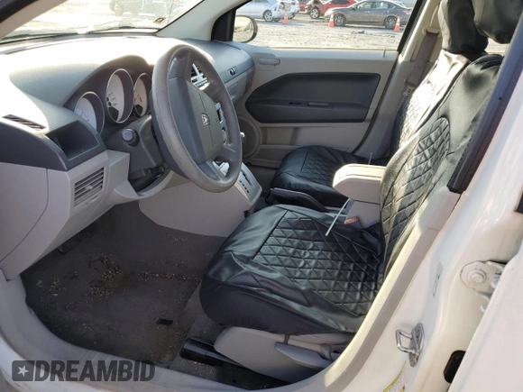 2007 Dodge Caliber SXT with VIN 1B3HB48B77D554179, listed as a Copart auction lot 51833605 with 116,067 mi miles and Salvage Title. Bid and sale history available at DreamBid. Image 7.