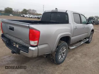 2017 Toyota Tacoma SR5 with VIN 5TFAZ5CN6HX030668, listed as a IAAI auction lot 41429982 with 92,565 mi miles and . Bid and sale history available at carsss.com. Image 4.