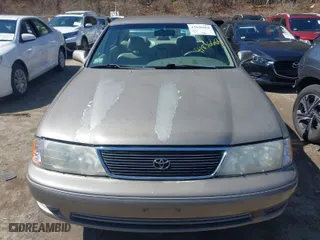 1999 Toyota Avalon XL with VIN 4T1BF18B5XU322781, listed as a IAAI auction lot 41836664 with NaN miles. Bid and sale history available at carsss.com. Image 6.