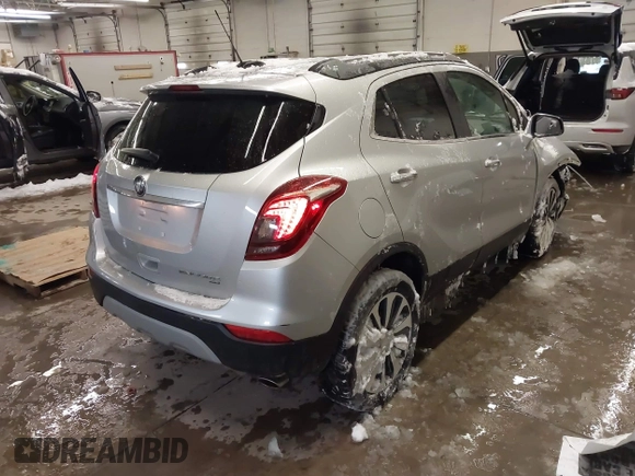 2021 Buick Encore Preferred with VIN KL4CJESB5MB308467, listed as a IAAI auction lot 41569987 with 52,199 mi miles. Bid and sale history available at carsss.com. Image 4.