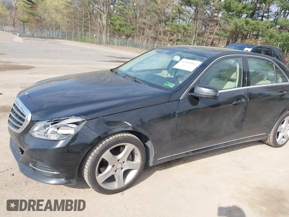 2014 Mercedes-Benz E E 350 Luxury with VIN WDDHF8JB2EA894977, listed as a IAAI auction lot 42065062 with 197,393 mi miles. Bid and sale history available at carsss.com. Image 6.