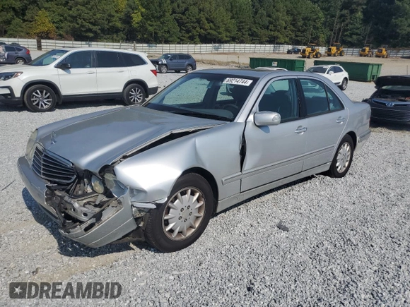 2001 Mercedes-Benz E-Class with VIN WDBJF65J11B272438, listed as a Copart auction lot 69214744 with 194,492 mi miles and Salvage Title. Bid and sale history available at carsss.com. Image 1.