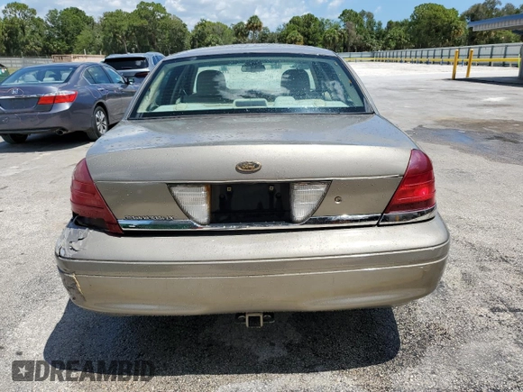2006 Ford Crown Victoria LX z VIN 2FAFP74V56X126245, wystawiony jako Copart lot #56598055 z przebiegiem 91 400 mil mil oraz Szkody całkowita. Historia ofert i sprzedaży dostępna na DreamBid. Obrazek 6.