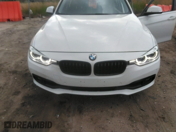 2018 BMW 3 Series 320i with VIN WBA8E1G57JNU91633, listed as a IAAI auction lot 42065119 with 55,062 mi miles. Bid and sale history available at carsss.com. Image 6.