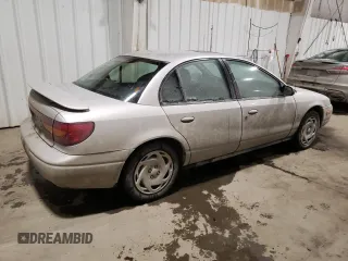 2000 Saturn SL with VIN 1G8ZK5273YZ239987, listed as a Copart auction lot 41577615 with 145,659 mi miles and Salvage title. Bid and sale history available at DreamBid. Image 3.